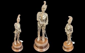 Silver Plated Napoleonic Cavalry Officer, realistically modelled, on wooden plinth. Height 10''.