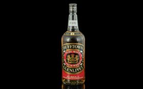 Bottle of Dufftown Glenlivet 8 Year Old Pure Malt Whisky, No. 72219. Nose: Mellow honey and
