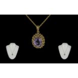 Ladies - Attractive 9ct Gold Amethyst Set Pendant with 9ct Gold Attached Chain. Both Pendant and