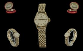 Omega Ladies 9ct Gold Mechanical Wrist Watch with 9ct gold watch bracelet circa 1960's with original