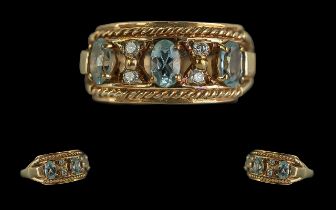 Ladies Attractive 9ct Gold Aquamarines and Diamond Set Ring. Full Hallmark to Interior of Shank. The