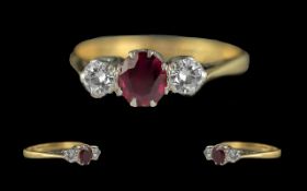 Ladies - Attractive 18ct Gold and Platinum 3 Stone Diamond and Ruby Set Ring. Marked 18ct to