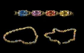Ladies - Attractive 9ct Gold Multi-Gem Set Line Bracelet. Marked 9ct. Excellent Assorted Colours -