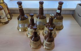 Seven Bells Scotch Whisky Decanters, assorted sizes, without contents, all marked Wade and Perth,