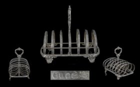 Mid Victorian Period Excellent Sterling Silver Six Tier Toast Rack raised on 4 well cast ornate feet
