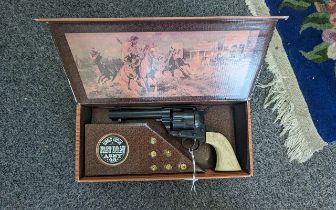 Single Action Fast Draw Army 45 Replica, in box with replica bullets.