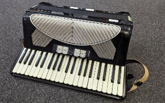 Hohner Verdi III Piano Accordion with leather shoulder straps, in good condition.