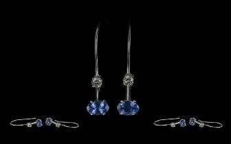 Pair of 14ct White Gold Drop Earrings, set with Tanzanite and diamond. Drop style with small round