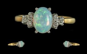 Ladies - Fine Quality 18ct Gold Opal and Diamond Set Ring. Marked 750 - 18ct to Interior of Shank.