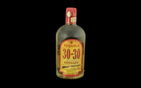 Vintage Tequila 30-30 Reposado 100% de Agave. This reposado tequila was crafted in Capilla de