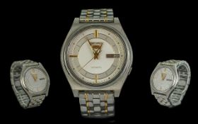 Seiko 5 Gents Automatic Day-Date Steel & Gold Tone Wrist Watch, circa 1990's. Features white dial,