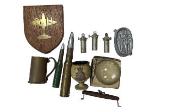 Collection of RAF Memorabilia, including a brass airplane on a wooden shield, trench art, Range