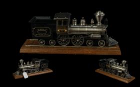 Novelty Table Lighter in the Form of a Steam Train, steel model train with a plaque inscribed