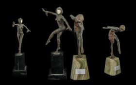 Pair of Art Deco Style Figures, one of a dancing figure on a black base, the other of a dancing