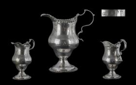 George III Sterling Silver Cream Jug of small proportions. Hallmark London 1770, maker T.S. - Thomas