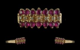 Ladies 14ct Gold Attractive Ruby and Diamond Set Dress Ring. Marked 14ct to Shank. Rubies and
