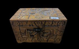 A Small Oriental Wooden Camphor Box, carved throughout, 12'' x 7.5''.