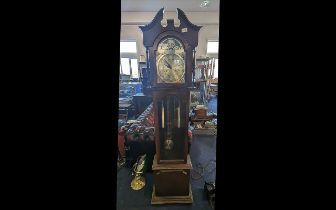 Lincoln Grandmother Clock, with mirrored gilt decorated face and Roman numerals. 31 day, measures