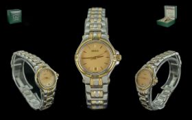 Gucci Ladies Steel and Gold Tone Wrist Watch model no GU440L serial no 0007799 date of purchase 5-