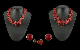 Two Coral Necklaces, together with a pair of coral stud earrings, in box.