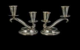 Pair of Silver Candlesticks, one low and