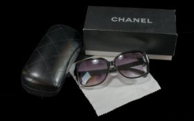 Pair of Chanel Sunglasses, Style Pearl Black. Sold at Selfridges for £228 (label on box). Comes in