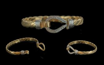 A Fine 9ct Gold Diamond Set Bangle of Solid Construction. Pleasing Design. Marked 9.375. Diamonds of