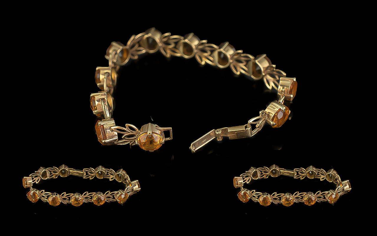 Ladies Attractive 9ct Gold Orange Topaz Set Bracelet of Pleasing Design with Full Hallmark. The Well