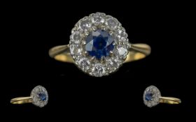 18ct Gold Diamond and Sapphire Set Cluster Ring. Marked 18ct to Interior of Shank. The Blue