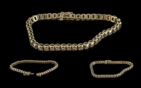 14ct Gold - Attractive Diamond Set Tennis Bracelet. Marked 14ct, Set with Well Matched Diamonds,