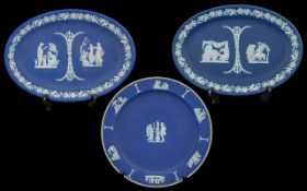 Wedgwood Fine Trio of Blue Jasper Ware Wall Plaques, each depicting raised Classical images on a
