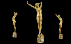 AFTER PAUL PHILIPPE A PATINATED ART DECO FIGURAL BRONZE STATUE of a young outstretched female nude -