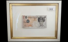 Banksy Interest - Di-Faced Tenner, mounted and framed. Back of frame with clear aperture to view