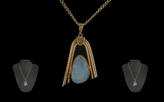A Fine Quality 9ct Gold Opal Set Pendant. The Large Opal of Excellent Colours. Est Weight 8.00