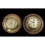 Two Vintage Ship's Clocks, one by Smiths and one Nauticalia, both mounted on wooden bases.