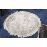 Collection of Three Rugs to include a Rectangular Wool Rug in pale green with floral pattern,