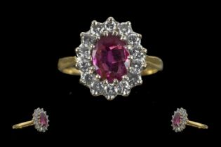 Ladies 18ct Gold Pleasing Ruby and Diamond Set Ring. Marked 750 - 18ct to Interior of Shank. Ruby of