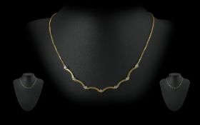 Ladies Elegant 18ct Gold Diamond Set Necklace, Marked 750 - 18ct. Set with 7 Small Well Matched