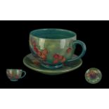 Moorcroft Tubelined 'Birds and Berries' Design Cup and Saucer. On Green Ground. Both Cup / Saucer In