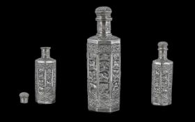 Late 19th Century Anglo - Indian Silver Bottle, Decorated with Embossed Images of Wild Animals,