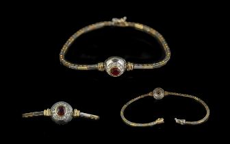 Ladies - 14ct Two Tone Gold Ladies Petite Bracelet, The Centre Set with Sapphire and Diamond