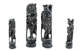 Japanese Pair of Well Carved Rootwood Mythical Figures, circa 1890s; each stands 13 inches (32.5cms)