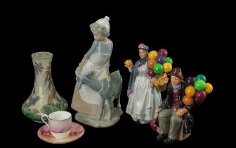 A Mixed Lot of Pottery to include Royal Doulton the Balloon man, Royal Doulton Biddy Penny Farthing,