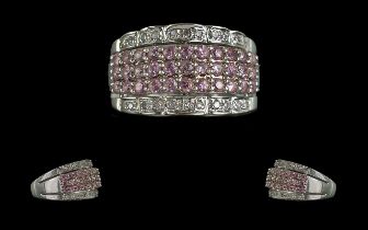 Ladies 18ct White Gold Pleasing Diamond and Pink Sapphire Set Dress Ring. Marked 750 - 18ct to