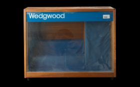 Wedgwood Display Case, pull down glass front, lined in blue velvet, wooden base, measures 20''
