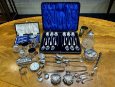 Mixed Lot of Silverware to include boxed set of 12 silver teaspoons and sugar nips, christening