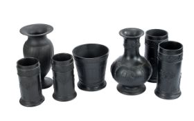 Wedgwood Collection of 19th and 20th Century Assorted Black Basalt Vases, seven vases decorated with