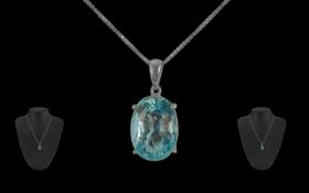 Aquamarine Pendant Set in 18ct White Gold, suspended on an 18ct white gold chain 17'' long. 6.1