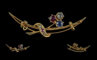15ct Diamond, Ruby & Sapphire Brooch, in the form of a posy of flowers. Weight 3.25 grams.