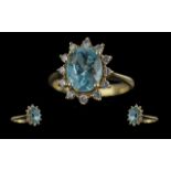 Ladies Attractive 18ct Gold Aquamarine and Diamond Set Ring, flower head design, marked 18ct to
